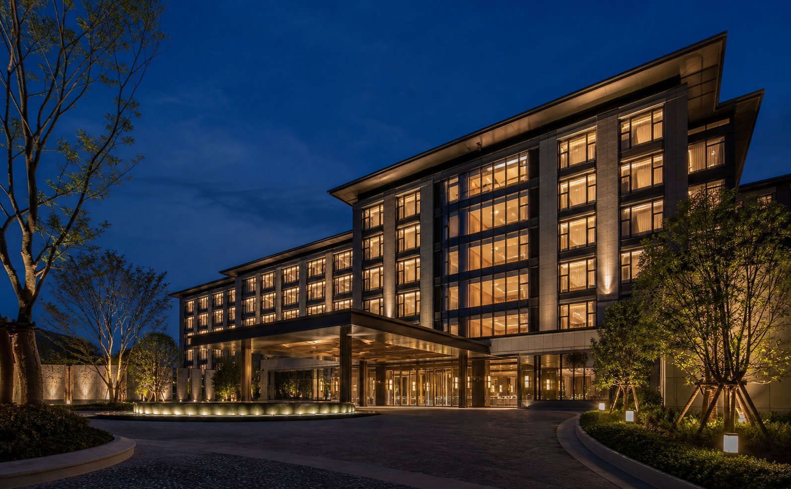 Luxury hotel exterior at twilight